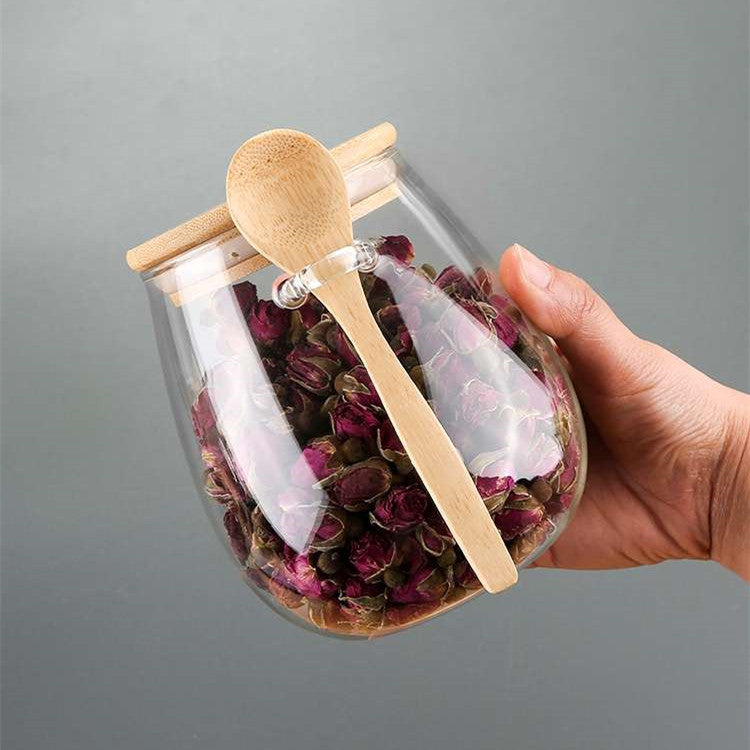 Transparent glass storage jar